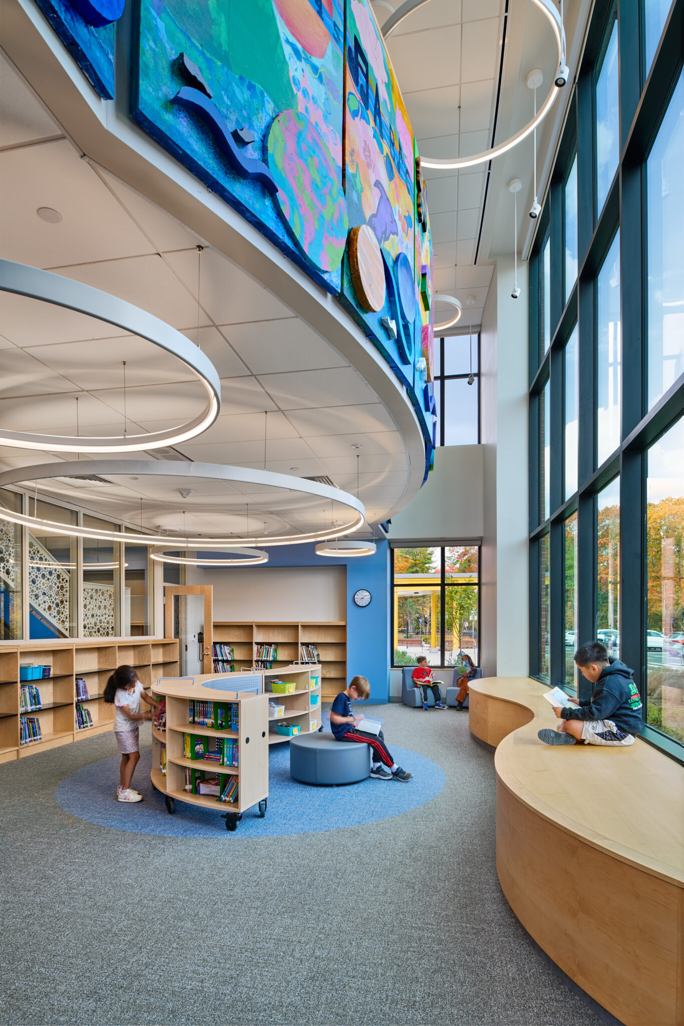 Swampscott Elementary School library with students reading